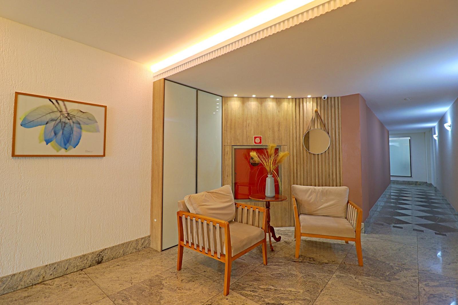 Apartamento à venda no Centro de Guarapari-ES: 2 quartos, 1 suíte, 2 salas, 2 banheiros, 1 vaga, 78m² de área.
